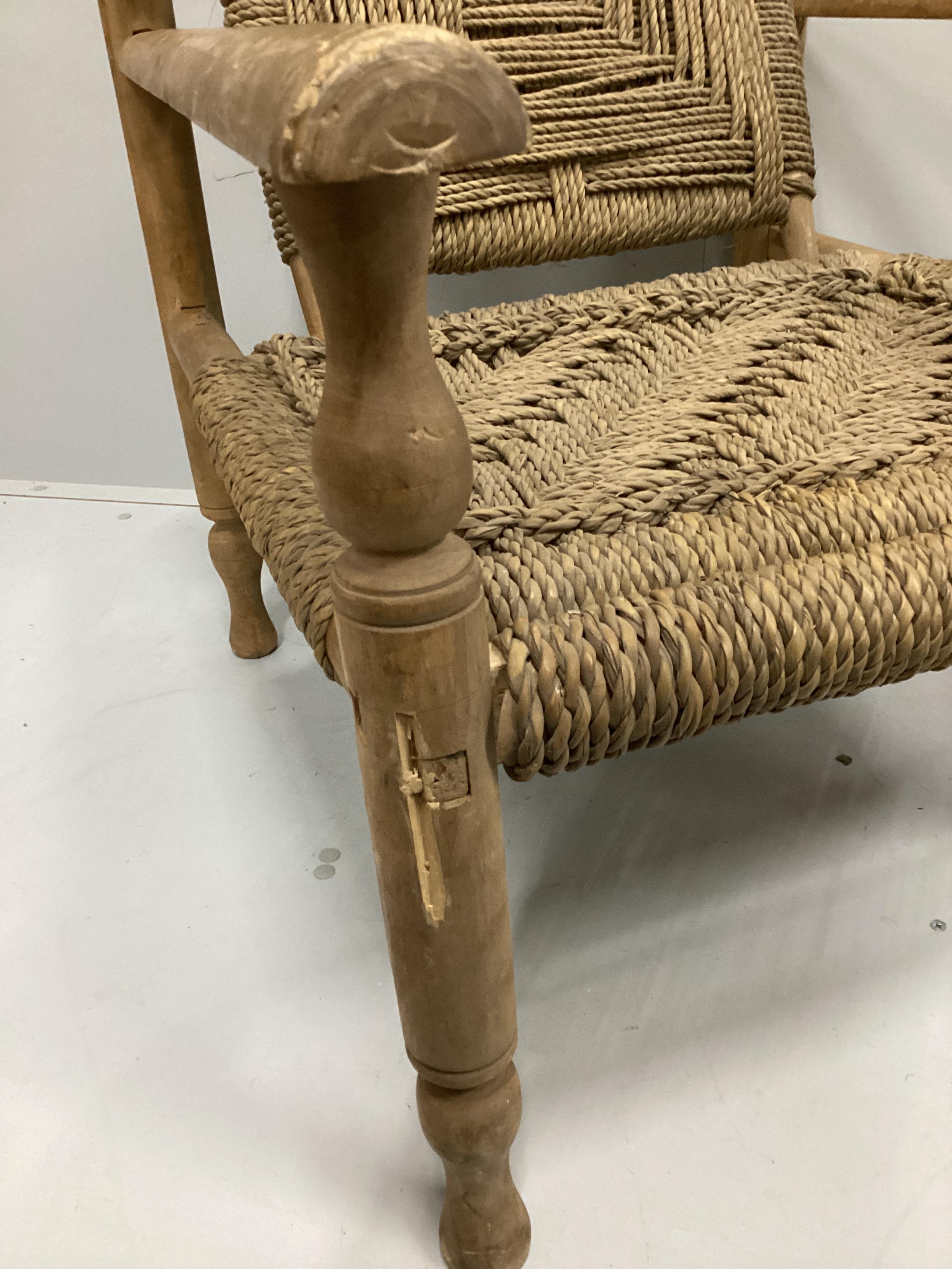 In the manner of Adrien Audoux and Frida Minet a sisal weave beech elbow chair, width 63cm, depth 74cm, height 81cm.